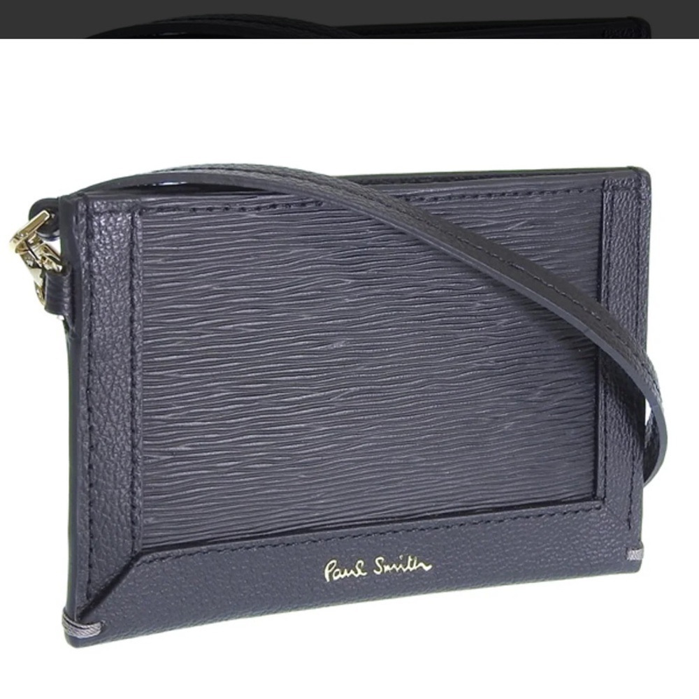 Check out Paul Smith!!Black Textured Leather card holder. NWOT.  Men or women’s